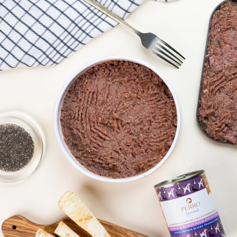 Perro Gourmet - Sarna z korzeniem pietruszki 400g - wygięta puszka